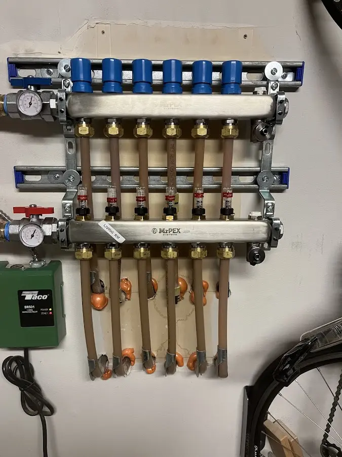 Plumber performing Water Heater Repair at a residential property in Keller